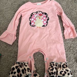Pink One Piece Footies with Ruffled Sleeves and Floral Design